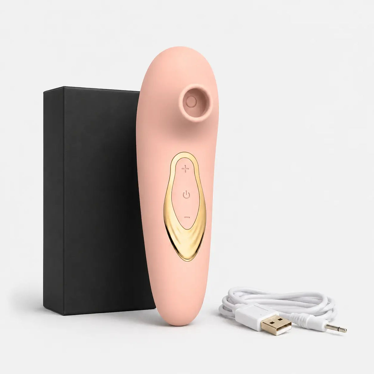 Stimulateur par aspiration Halo rose poudré avec son coffret noir et son câble de charge USB