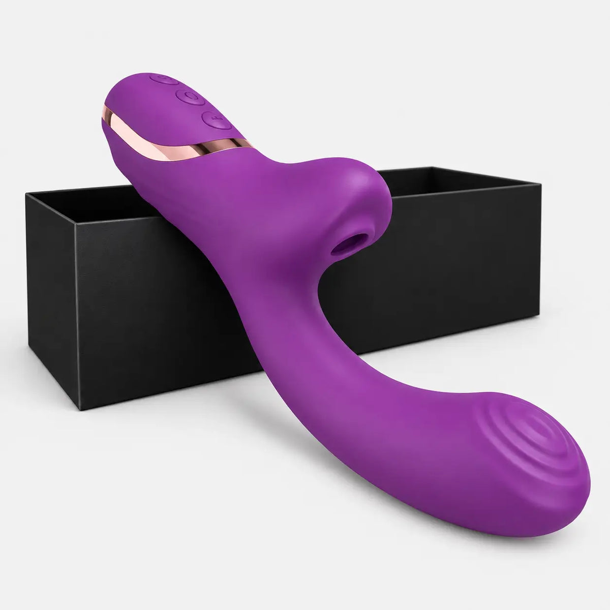 Vibromasseur Écrin violet améthyste posé contre son coffret noir